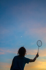badminton player gestures outdoor silhouette