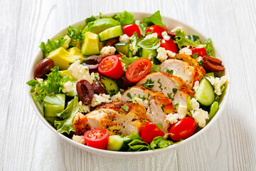 Mediterranean grilled Chicken Salad in white bowl