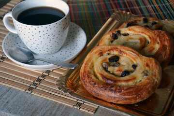 Breakfast with various of traditional french croissants, bread with chocolates, grapes on rustic.


