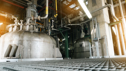 Industrial revolution, energy and technology concept,The equipment of oil refining, industrial equipment pipelines of an oil-refinery plant, Detail of oil pipeline with valves in large oil refinery,