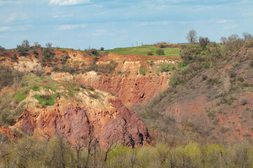 Soil erosion, sliding, and caving. Inside the landslide is rock. Consequences of underground mining - ground failure.