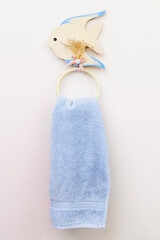 Cute fish bathroom ring holder and blue towel