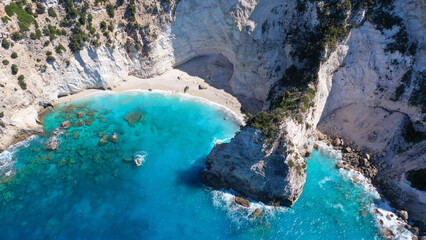 Aerial drone photo of steep white cliffs in secluded paradise beach in Northern part of Kefalonia...