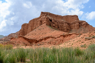 Fototapeta premium Red canyon Konorchek (Suluu-Terek) in the mountains in Kyrgyzstan