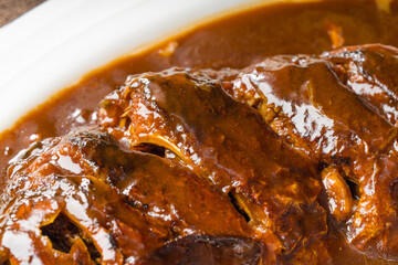 Braised crucian carp on a simple background