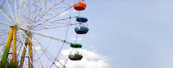 ferris wheel against the sky. Banner, copy space