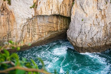 Fototapeta na wymiar cliff cavesea