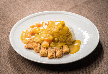 Curry pork chop rice on monochrome background