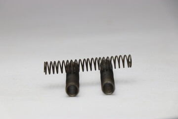 View of coiled metal compression springs placed in such a way to have a view from different angles