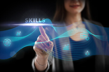 Business, Technology, Internet and network concept. Young businessman working on a virtual screen of the future and sees the inscription: Skills