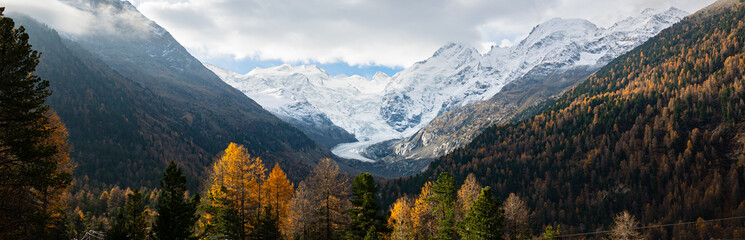 Panoramic view of Morteratsch valley and glacier in Switzerland in autumn