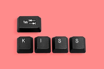 Keyboard letters in rose background, kiss concept, love