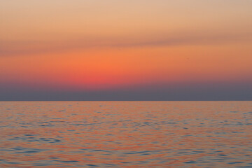 Fototapeta na wymiar Purple sunset over the Black Sea, Batumi beach