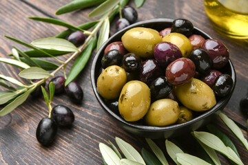Mixed green olives and black olives with olive oil, healthy eating antioxidants