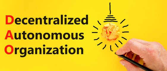 DAO decentralized autonomous organization symbol. Concept words DAO decentralized autonomous...