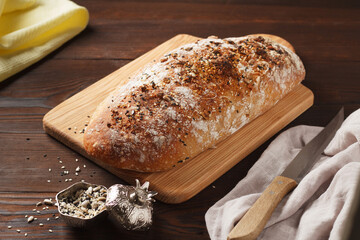 Freshly baked at home healthy bread with seeds.