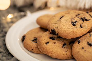 Cookies with chocolate chips close-up on a plate.