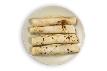 Pancakes on a cream colored plate isolated on transparent background