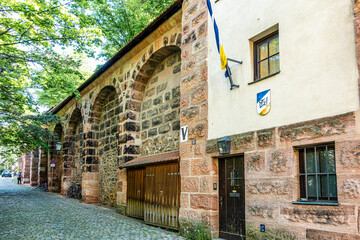 Fototapeta na wymiar Huebnerstor city gate and tower in the historic city of Nuremberg in Germany.