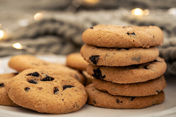 Cookies with chocolate chips close-up on a plate.