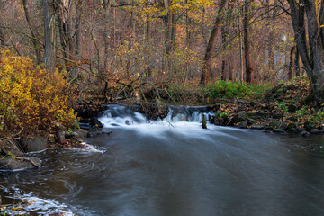 A lovely little waterfall in an autumn scenery