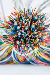 Bundle of colored electric cables closeup