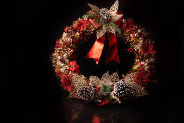 Christmas wreath, beautiful Christmas wreath all decorated with black background, selective focus.
