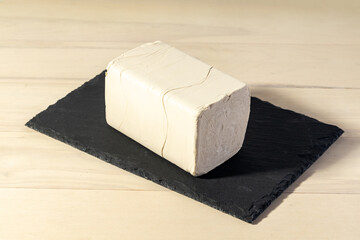 Pressed baking yeast on a tray