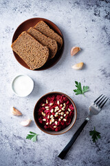 Beetroot salad with pine nuts in a bowl