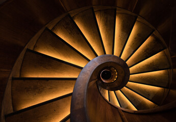 wooden spiral staircase   - Powered by Adobe