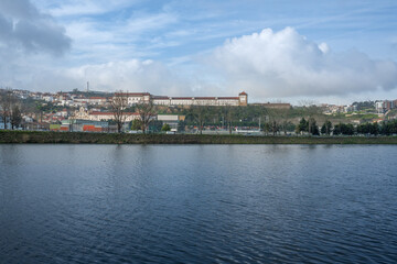 Obraz premium Coimbra Skyline with Monastery of Santa Clara-a-Nova, Sao Francisco Convent and Mondego River - Coimbra, Portugal