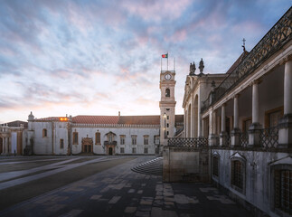 Clock Tower and University of Coimbra courtyard (Paco das Escolas) at sunset, former Royal Palace -...