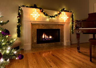 Natural gas insert heat fireplace glowing during the Christmas or New Year holiday - 544198807