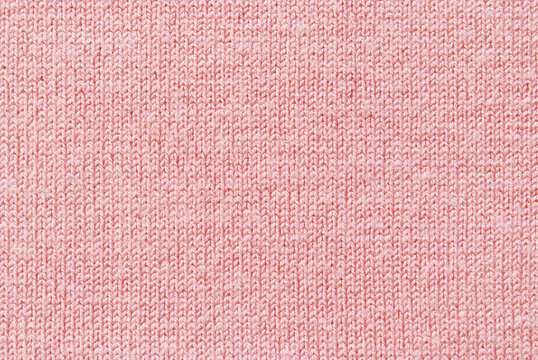 Light pink soft jersey fabric pattern texture as background	