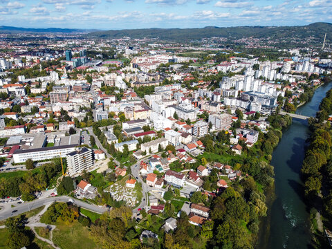 Aerial drone view of Banja Luka and river Vrbas, Bosnia and Herzegovina. Buildings, streets, parks and houses. City center of Banja Luka, view from above. 