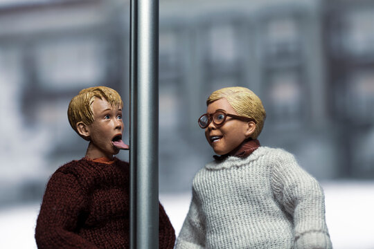 NEW YORK, USA,  NOV 9 2022: Mashup Scene From Christmas Story And Home Alone - Ralphie Parker Gets Kevin  McCallister To Put His Tongue On The Flagpole - Neca Action Figures