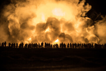 Creative artwork decoration war on Ukraine. Crowd looking on giant explosion and attacking soldiers.
