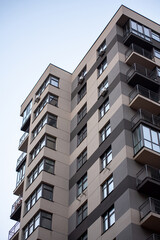 Multi-storey residential buildings and sky, city district