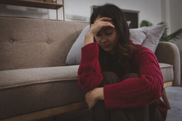 Fototapeta premium Frustrated confused Young asian teenager woman feels unhappy problem in personal life quarrel break up with boyfriend or unexpected pregnancy life stress concept