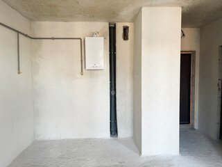 An apartment without decoration in gray tones of cement