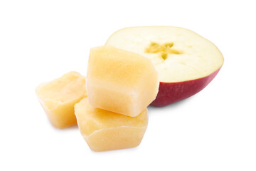 Frozen apple puree cubes and fruit on white background