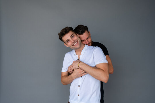 beautiful gay couple hugging