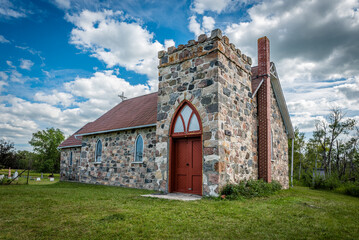 Fototapeta na wymiar St. Thomas Anglican Church near McLean, Saskatchewan, built entirely of fieldstone in 1898