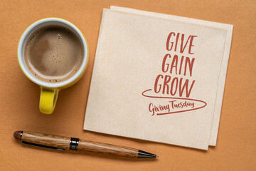 give, gain and grow - Giving Tuesday, business and personal development concept - handwriting on a...