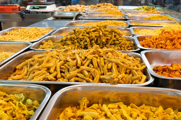 Bhujia, a spicy deep-fried sev filled with a burst of flavors, made using gram flour, moth flour, and different spices, crispy & crunchy traditional namkeen being sold in Jodhpur, Rajasthan, India.