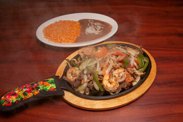 Mexican Shrimp Steak and Chicken Fajitas