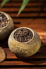 Chinese tea small green citrus tea on table.