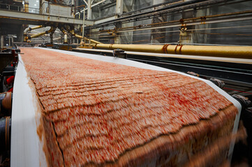 Colorful mineral salt material transported by conveyor belt