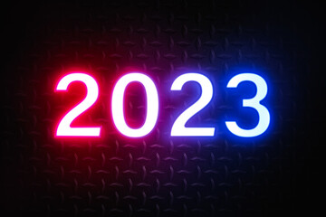 Happy new year 2023 background new year holidays card with bright sunlight, with arms raised new year 2023.