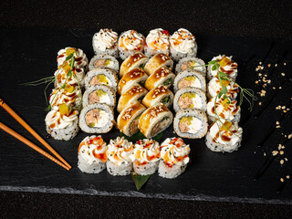 sushi on the black background